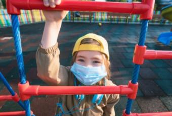 Toddler in a Mask