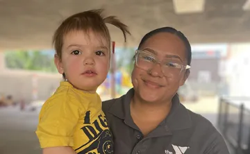 toddler with Y Academy teacher